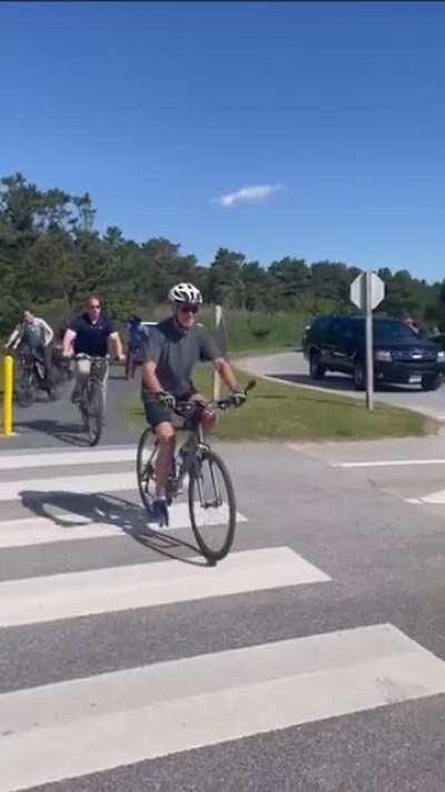 The President trying to ride a bike