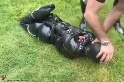 Extremely tight leather bondage