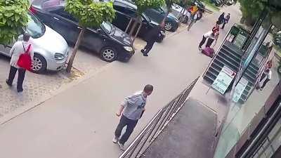 Guy randomly punches two ladies -- one elderly -- at the same time while walking down the street