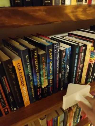 Book pusher - sliding wedge edition