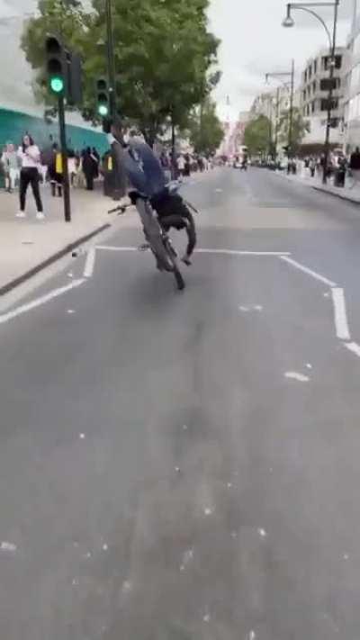 Doing a wheelie on public road