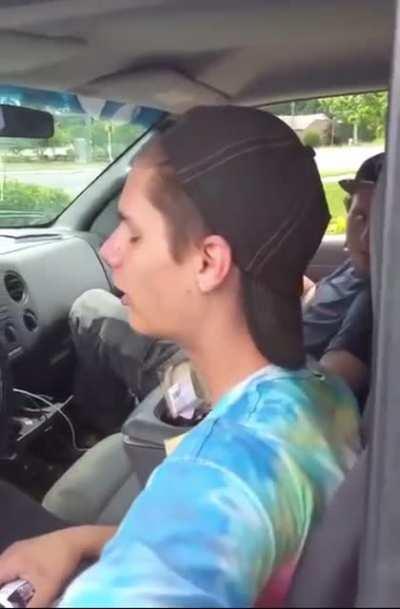 Puffing dust cleaner in the parking lot of a Mcdonalds