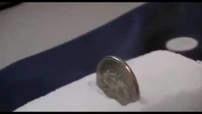 Inserting a Coin Into Dry Ice