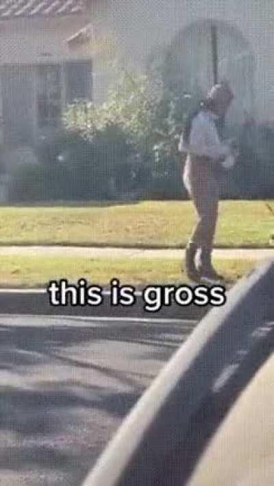 Mia Khalifa picks up dog poop with her mask and puts the mask back on