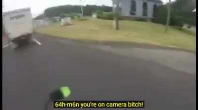 Woman tries to run biker off the road. Gets justice