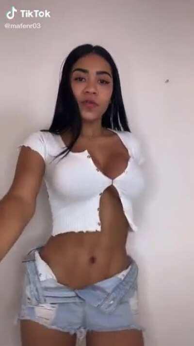 Does the immense pressure on her shirt buttons make anyone else anxious? NSFW