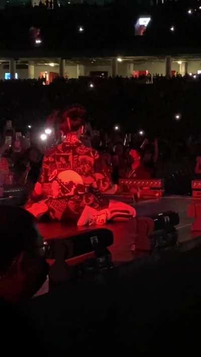 On her knees from behind