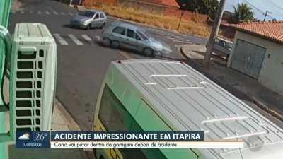 Car enters a random garage in accident.