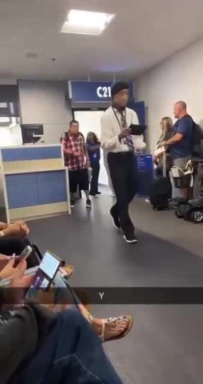 Getting high in the airport and boarding a plane.