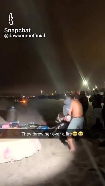 They throw her over a fire 💀