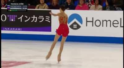 Ice Skater changes costume mid-performance