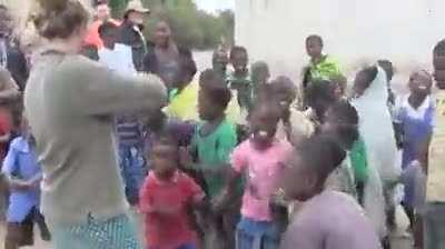 Positive freakout. Kids hearing grooving to the sound of music.