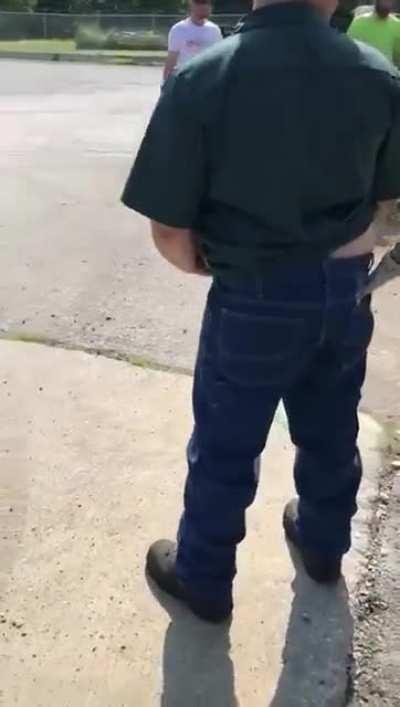 Pulling his co-workers pants down