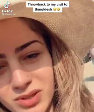 White chick enjoys her holiday in Bangladesh at the beach.