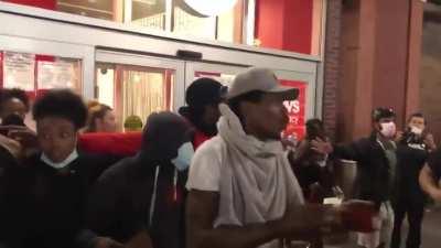 Protestors in Brooklyn stop greedy looters from consuming stolen goods