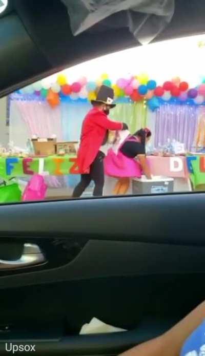 Clown lady has an interesting trick