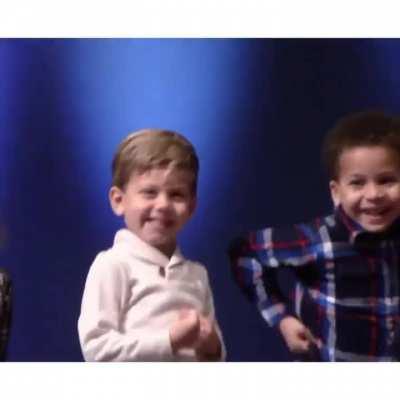 The young boy's reaction to seeing his mother in the crowd is wholesome.