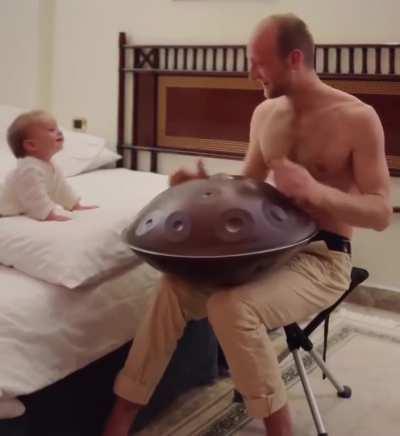 Father and Baby vibing to handpan music