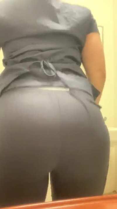 Nurse in scrubs shaking buns 🍑💥