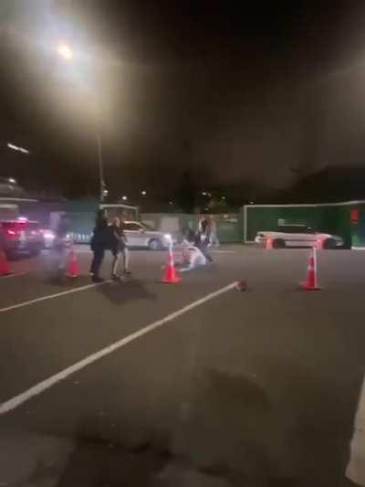 Guy hits bouncer outside nightclub in NZ.