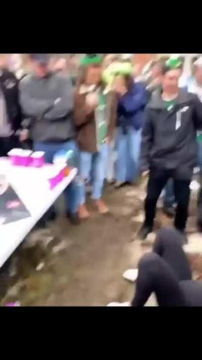Woman tries to impress everyone by jumping off the roof