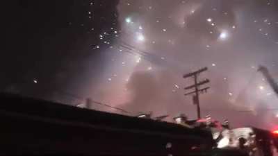 Firefighters trying to extinguish a magnesium fire with water. Magnesium burns at extremely high temperatures and splits water into hydrogen and oxygen. The hydrogen ignites, causing the fire to burn hotter and more violently. Instead, Class D fire exting