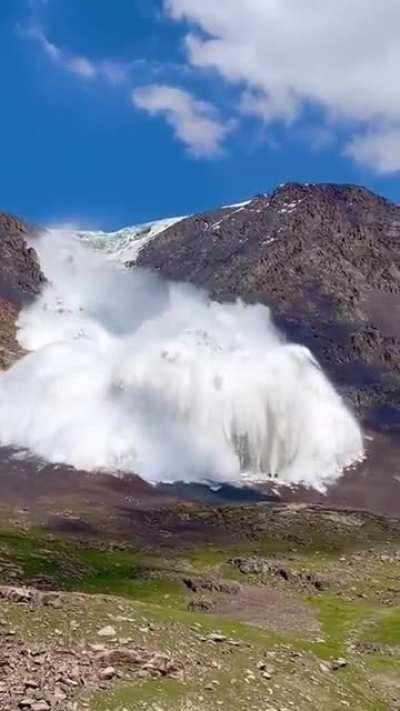 Unbelievable footage captured by tourists. Avalanche from the Tian Shan mountains in Kyrgyzsta...