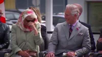 Prince Charles and Camilla trying not to laugh at these Inuit throat-singers.