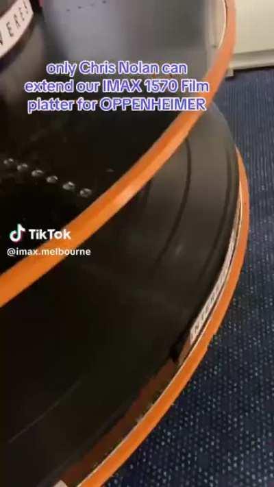IMAX Melbourne showing that platters have to be extended to support OPPENHEIMERs 180 minute runtime. Previous record was INTERSTELLAR at 169 minutes which fit on existing metal platters.