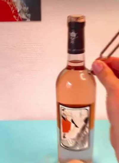 opening a bottle with a tuning fork