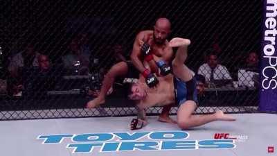 One of the craziest moves in fighting history (Suplex to armbar before he hits the ground)