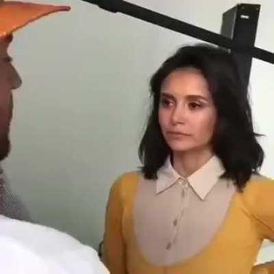 Nina Dobrev getting a head massage