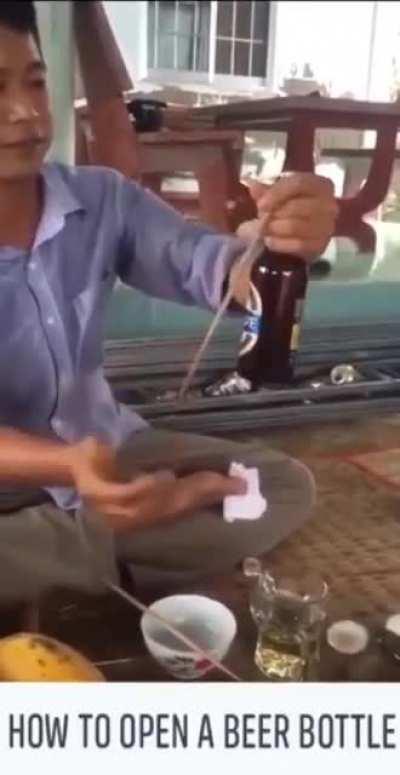 Opening a bottle of beer with a chopstick