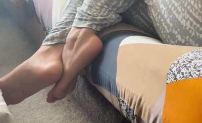 Friend's bare feet hanging off the couch pt 2