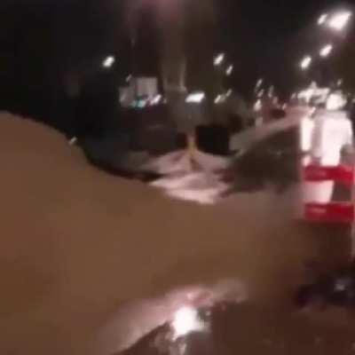 Driving like a stuntman down a sand mountain.