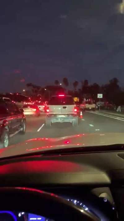 Delivery man on the freeway was watching some deliveries at the same time