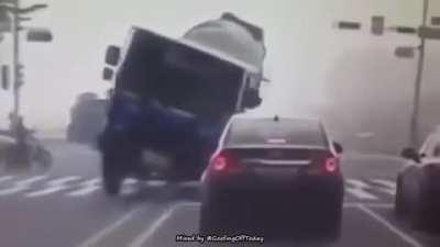 Car crushed by cement mixer