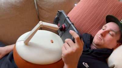 Help me settle an argument (I'm the Deckmate guy!): My GF says this is stupid AF, but I've never been more comfortable gaming. Would you buy it if I made it a real thing?