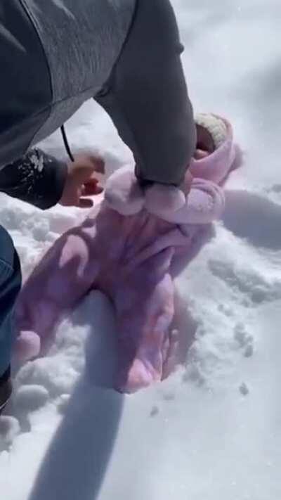Babies first snow angel