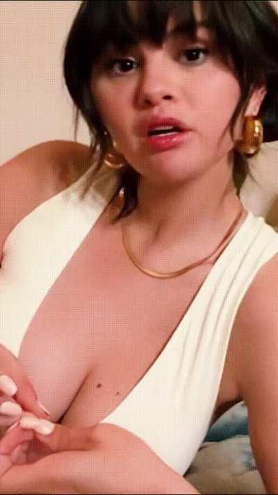 Selena Gomez is lecturing you, but your attention is going elsewhere. How do you react when she catches you ;)?