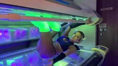 Neon Tanning Booth Demon