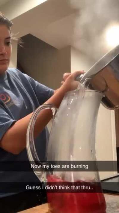 WCGW pouring hot liquid into a glass jar?