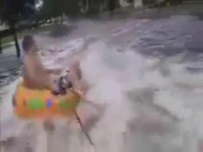 Water tubing in a flooded street