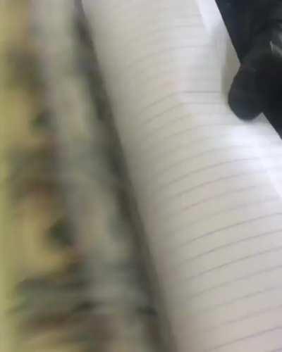 Federal agents discovered a book with counterfeit currency, but only after flipping though it in the opposite direction