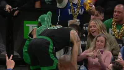 [Highlight] Fan hugs Jayson Tatum after he finishes the and-1 lay up and stumbles into the crowd