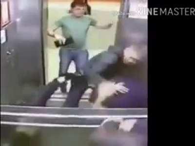 Dude smashes three guys in elevator