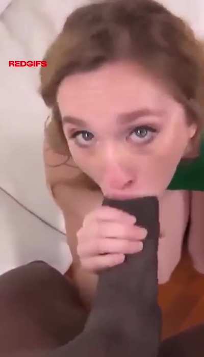 Doing her best with this ebony monster!