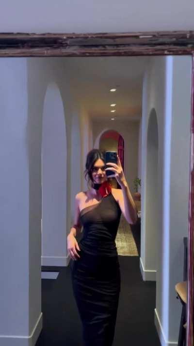Showing off her black dress