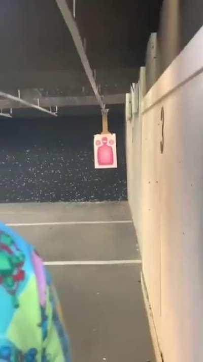 Trying to look cool at the shooting range