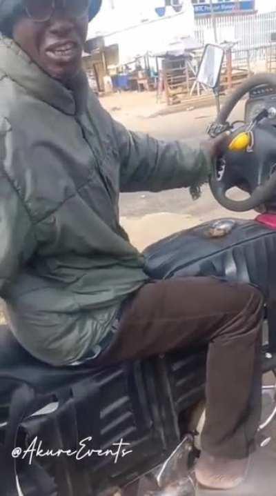 This guy modified his motorbike to have a gear, acceleration foot pedal and a steering wheel like a car